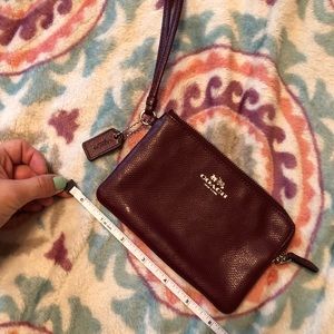 Coach maroon wristlet clutch